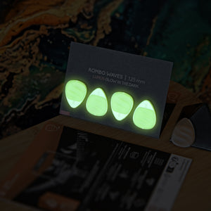 Guitar Pick Set Variety Pack Rombo (4 Guitar Picks) in the material Velvet Touch Lumus. Warmer tones, glow in the dark, and hand-polished in Germany.