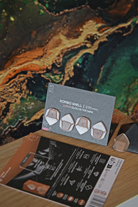 Guitar Pick Set Shell (4 Guitar Picks) in the material Velvet Touch Lumus. Warmer tones, glow in the dark, and hand-polished in Germany.